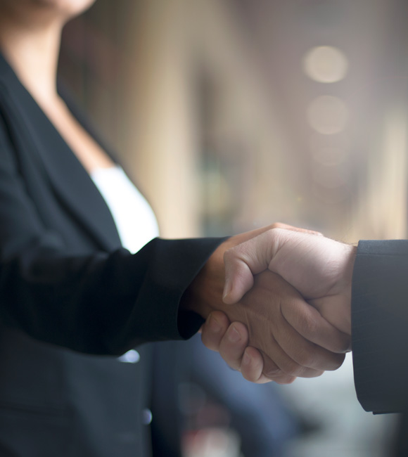 two people shaking hands
